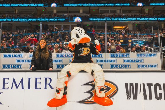 Wild Wing posing with the Anaheim Ducks in arena host